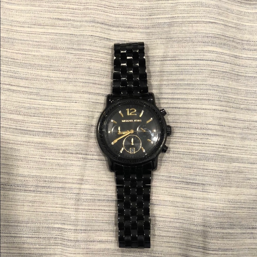 Women’s all black Michael Kors watch
